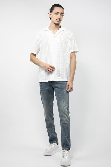 بنطلون جينز رجالي بمسحات باهتة