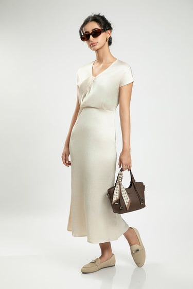 فستان نسائي طويل بأكمام قصيرة – لون موحد بقماش منقوش