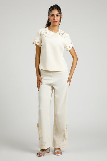 بنطلون واسع بتطريز ورود