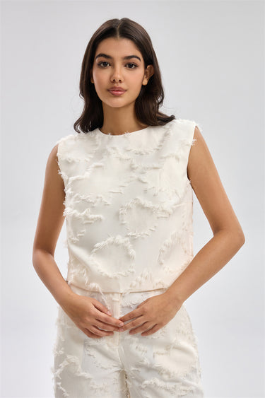 بلوزة نسائية بدون أكمام بقماش بارز