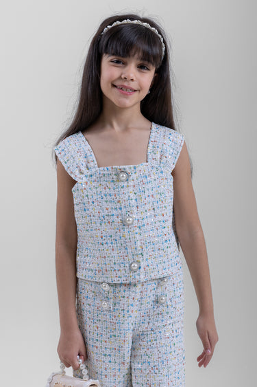 توب بناتي بدون أكمام بقماش منقوش