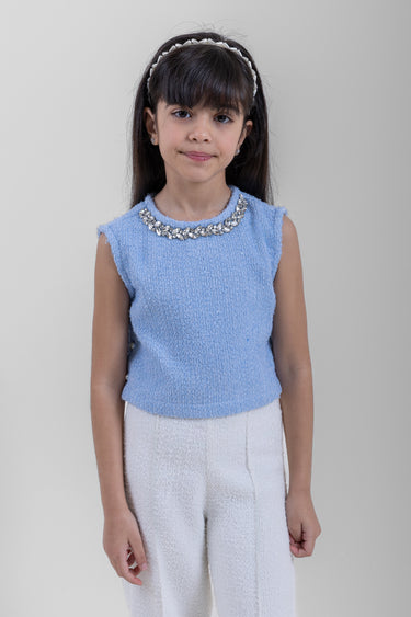 بلوزة بدون أكمام بتفاصيل مُزخرفة