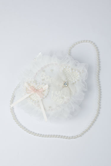 حقيبة صغيرة بشكل قلب